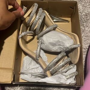 Worn once just for pictures size 12 but fit like a size 11 nude /silver stones